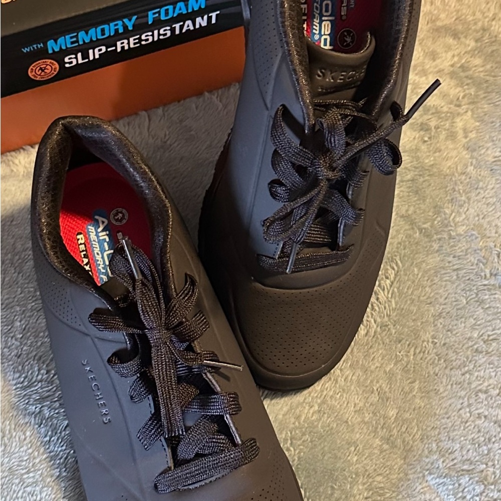 SOLD Skechers Black Sneakers with Minimalist Design